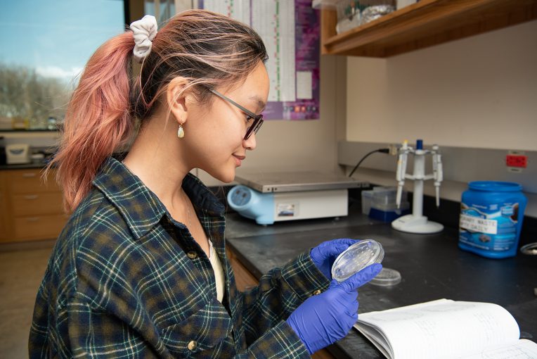 Woman student works in lab