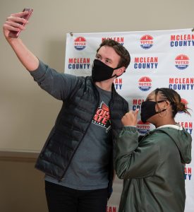 Students taking a selfie after voting