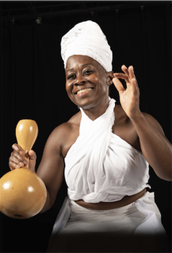 Dr. Ama Oforiwaa Aduonum with gourd instrument