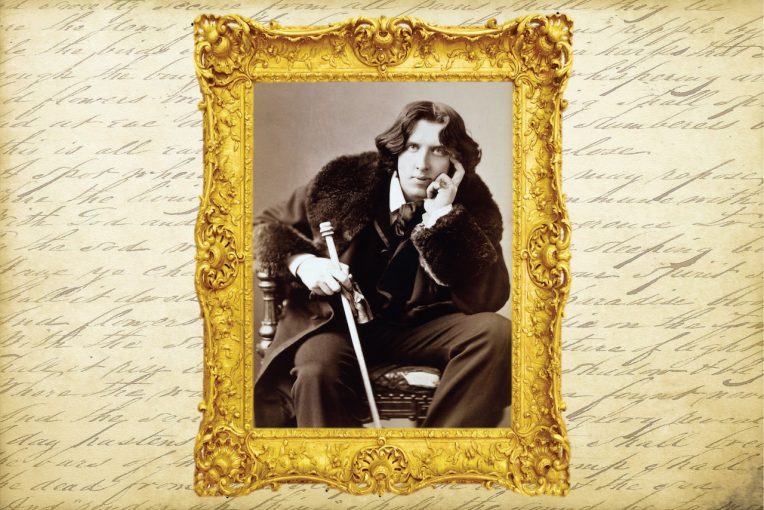 artwork from the production program Gross Indecency: The Three Trials of Oscar Wilde depicting an image of Oscar Wilde on a background of his writings