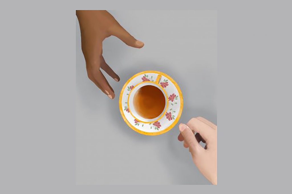 Production image for the play The DePriest Incident. Image of two hands, one white, one black passing tea.