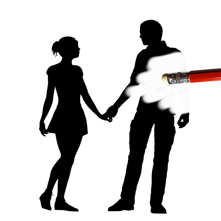 silhouette of a female and male holding hands with man being erased by a pencil, illustration