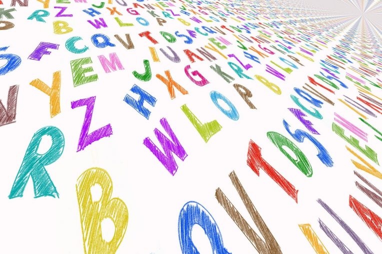 Colored letters on a piece of paper