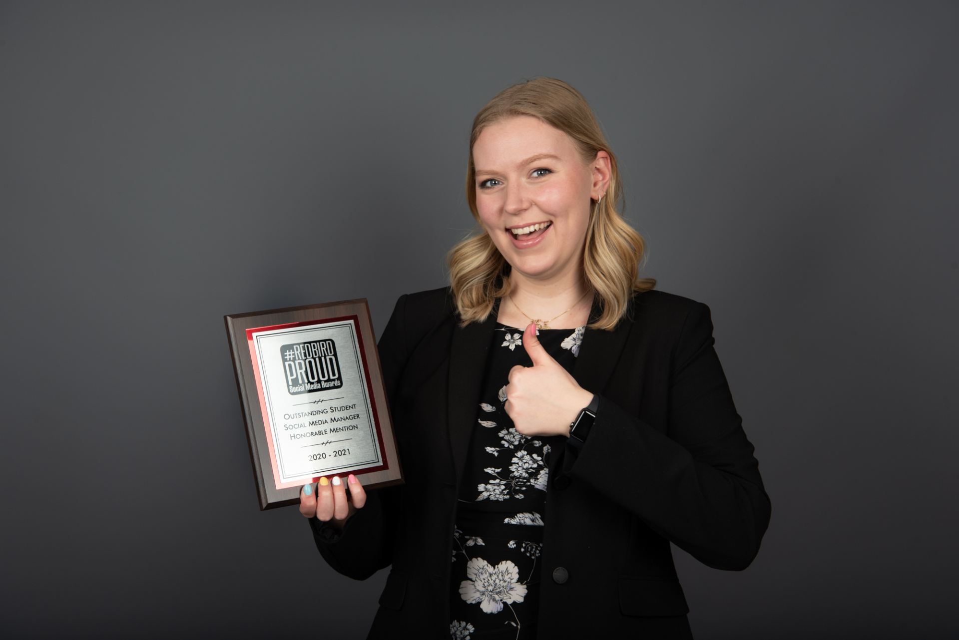 Sara Engstrom posed with award
