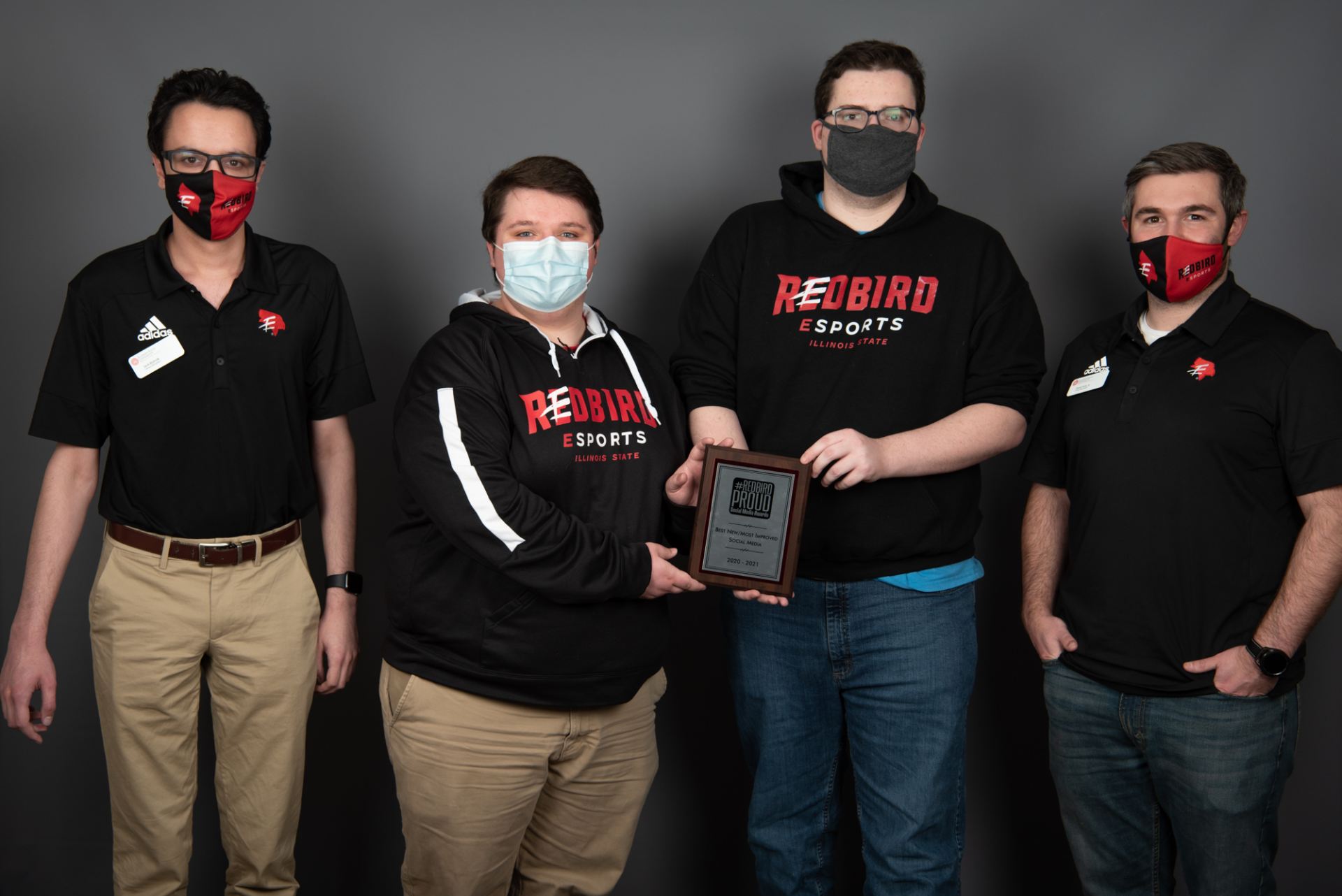 Redbird Esports posed with award