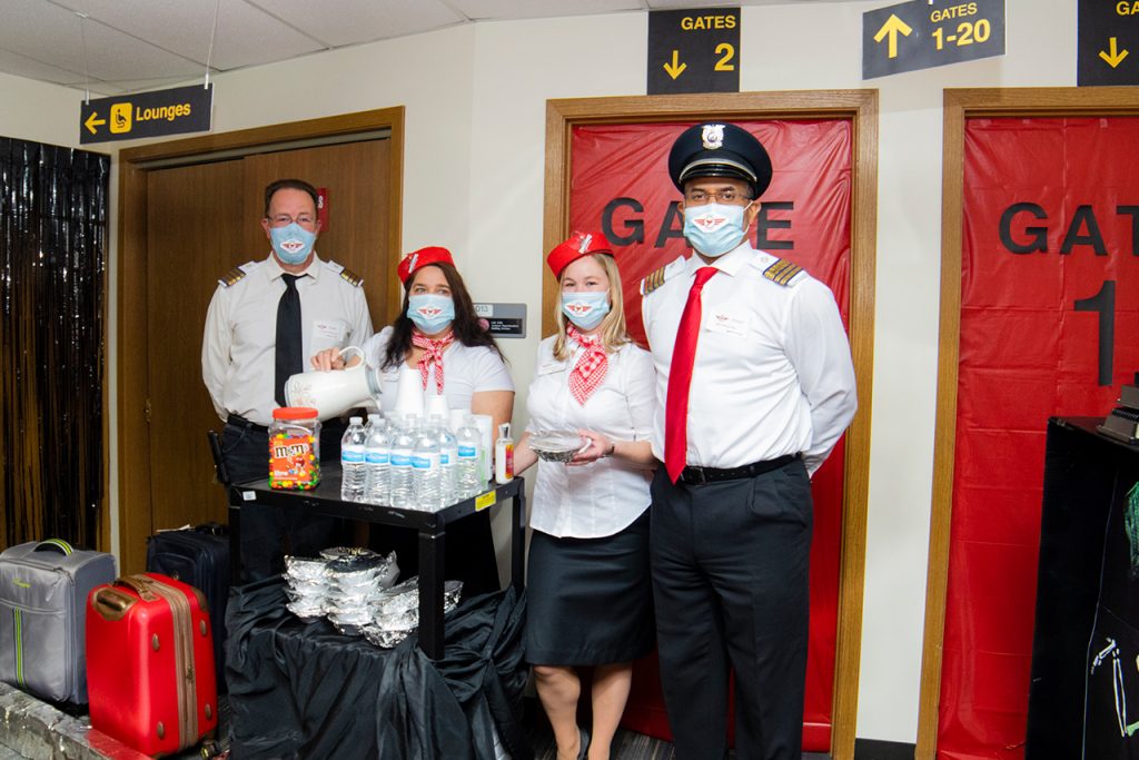people dressed as flight attendants