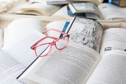 pair of glasses on a book