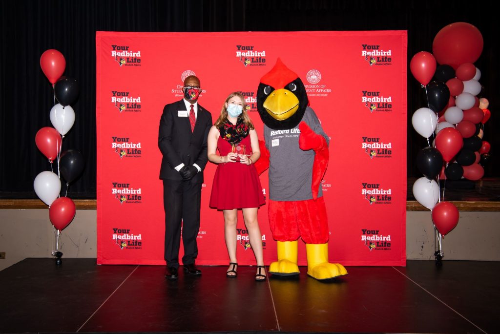 Jennifer Miller, Levester Johnson, and Reggie posing at the Student Involvement Awards