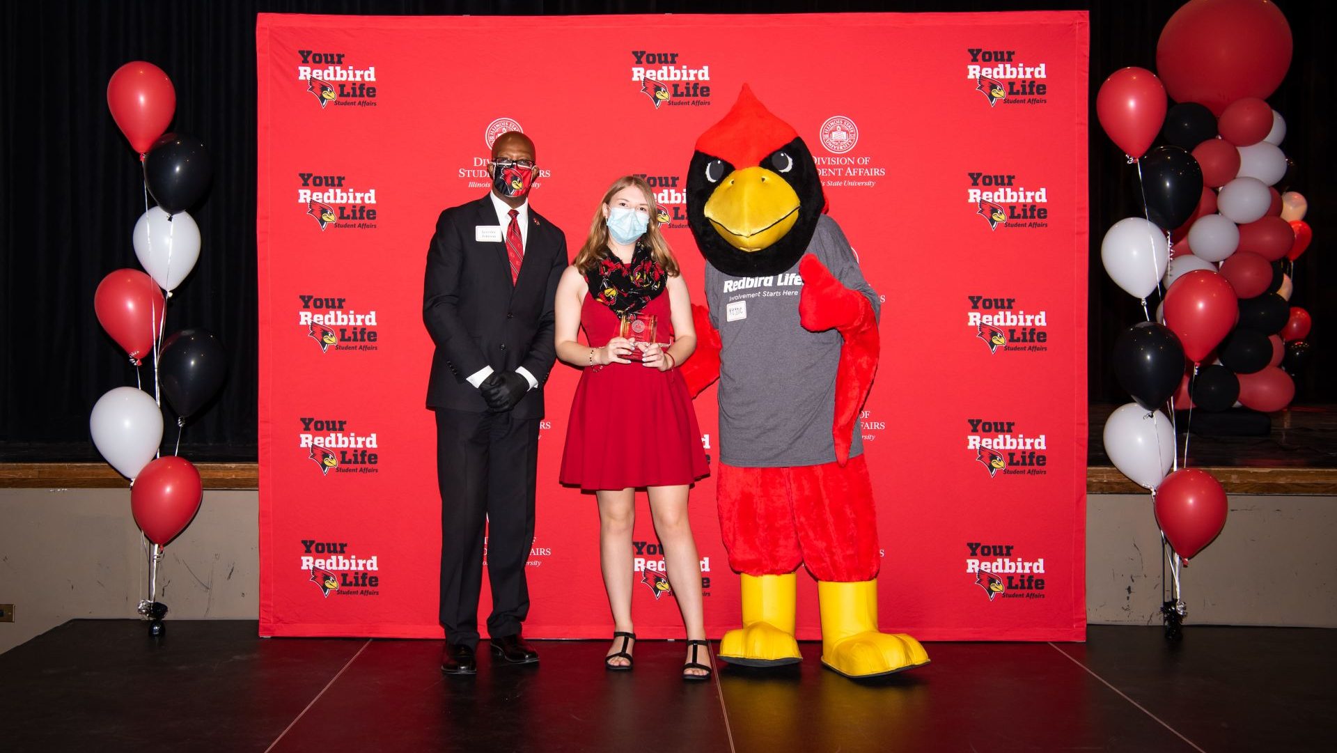 Jennifer Miller with Levester Johnson and Reggie Redbird at the Student Involvement Awards