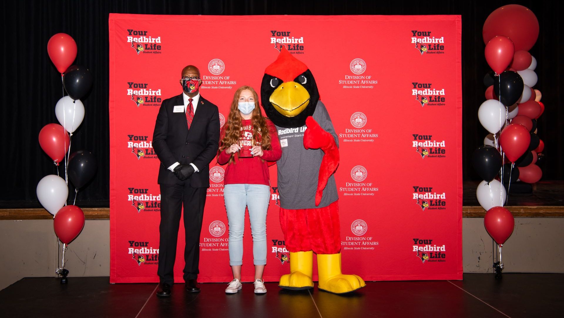 Rachel Frakes with Levester Johnson and Reggie Redbird at the Student Involvement Awards
