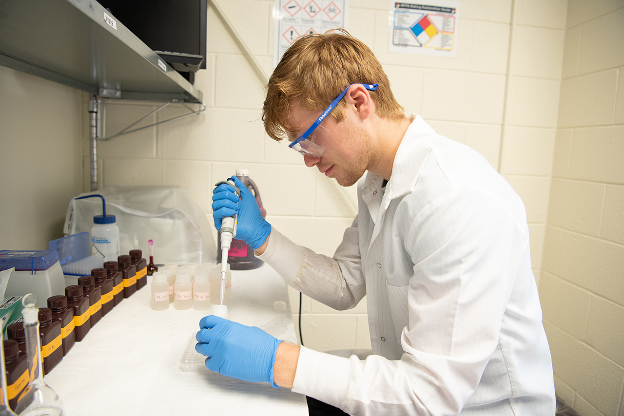 Joe Hoberg has been working in the lab and in the field as part of his groundwater research.