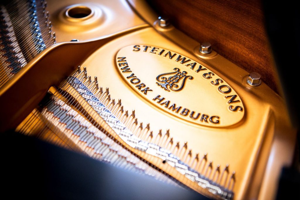 View of the piano plate depicting the Steinway & Sons logo