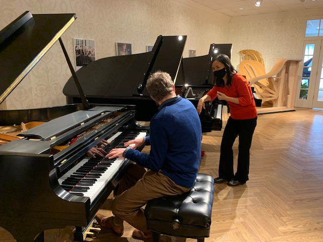 Associate Professors of piano Tuyen Tonnu and Geoffrey Duce at the Steinway Piano Gallery St. Louis in Maryland Heights, Missouri 
