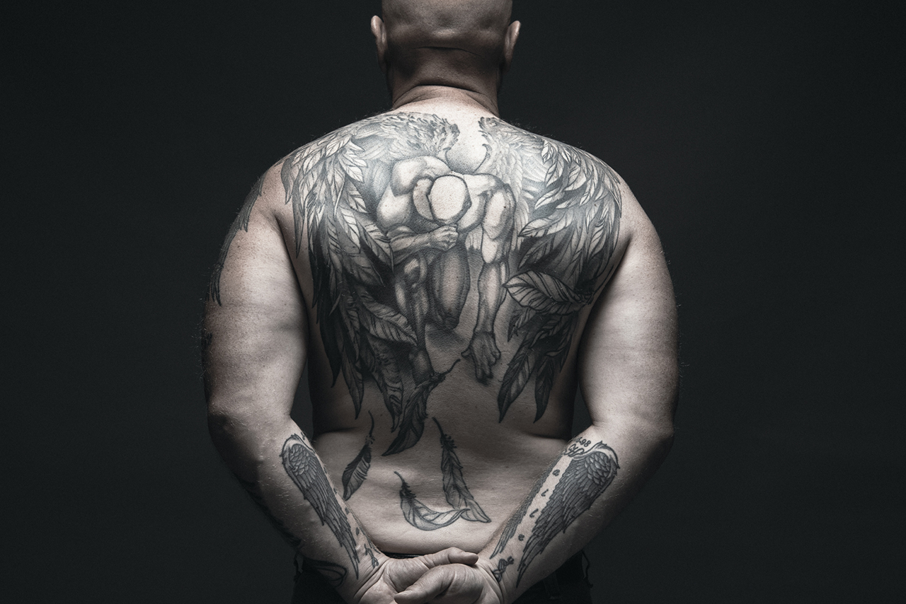 Brad Peiffer's tattoo on his back, created by Ricky Sturdivant, also symbolizes a feeling of loss.