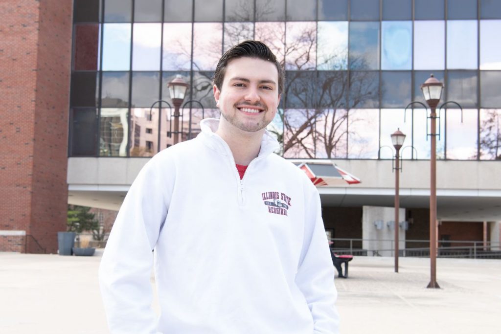 Dylan Toth poses in front of DeGarmo Hall.
