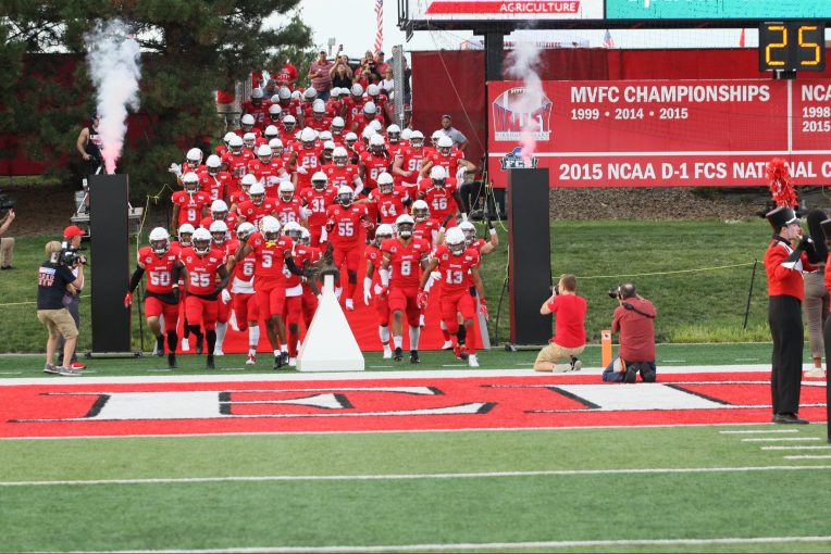 The Illinois State football team takes the field.