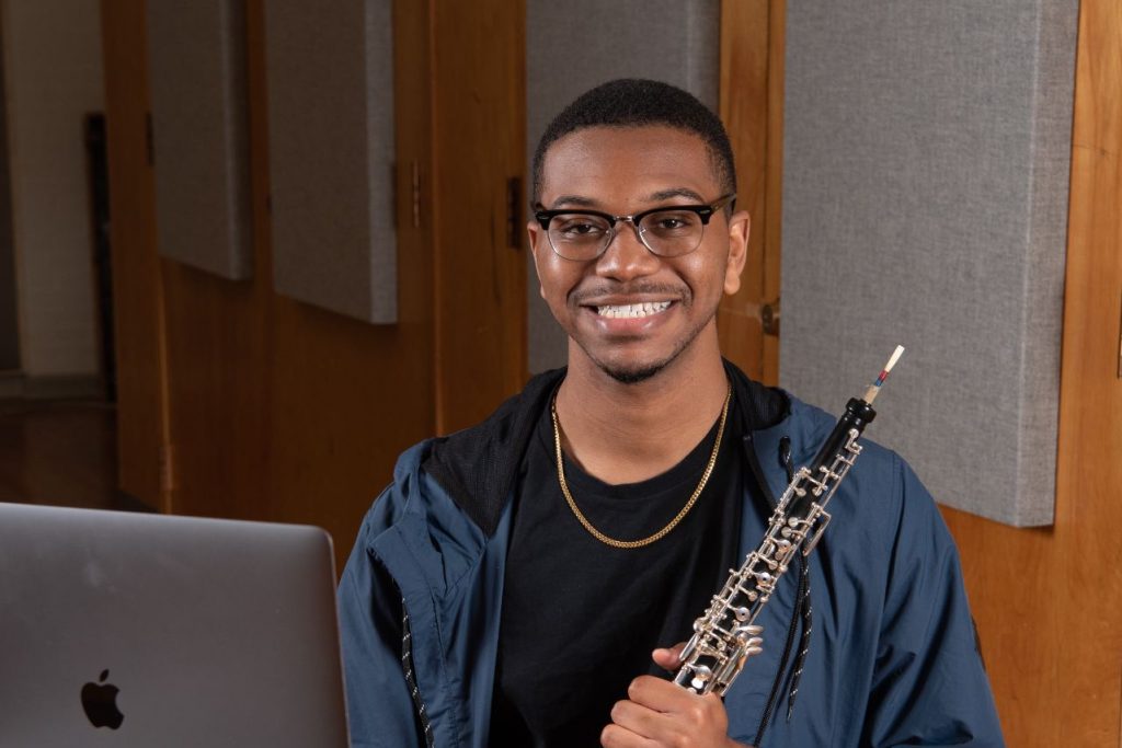 Tyler Bloomfield poses with his oboe.