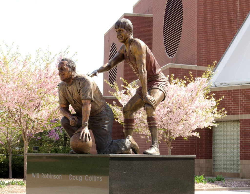A statue of Doug Collins and Will Robinson outside Redbird Arena