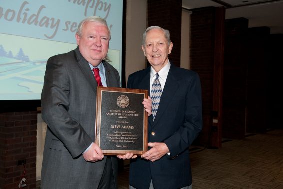 Dr. Neal Gamsky presents Steve Adams with the Quality of Student Life Award