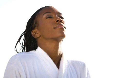 woman with her eyes closed in meditation