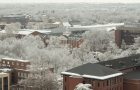 aerial shot of campus covered in snow