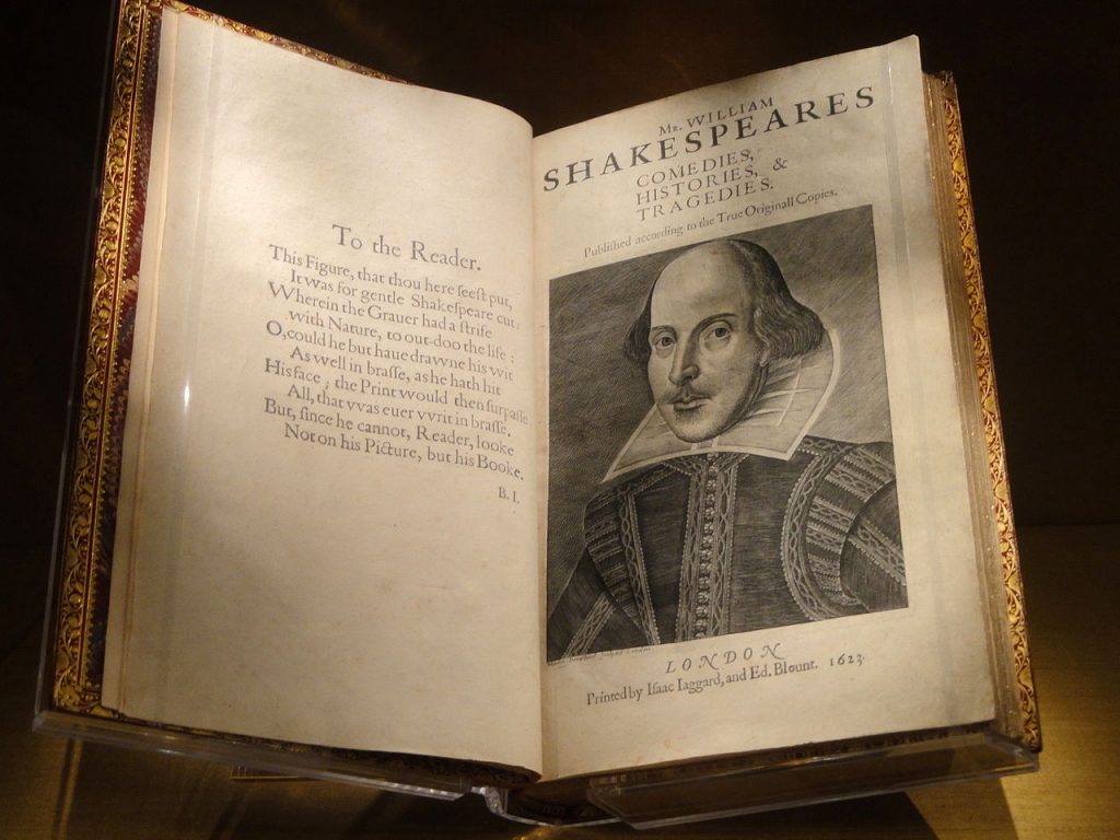 photo of the opening pages of Shakespeaer's first folio, with image of Shakespeare