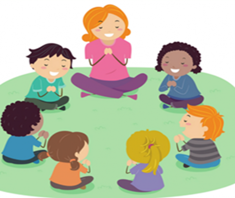 Photo of children sitting in listening circle