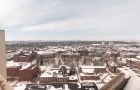 aerial shot of the Quad with snow-covered rooftops