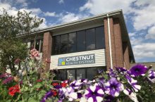 Chestnut Health Systems behind a bed of flowers