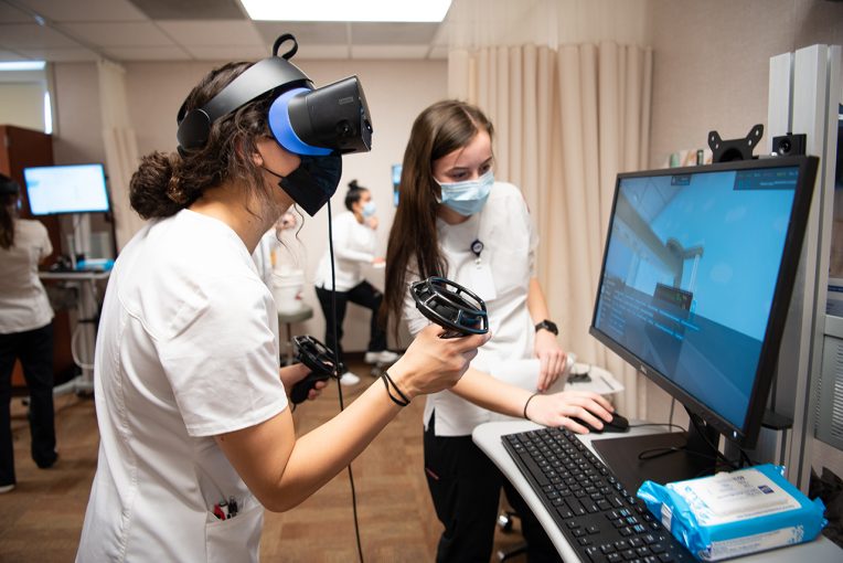MCN students use virtual reality headsets in nursing sim lab