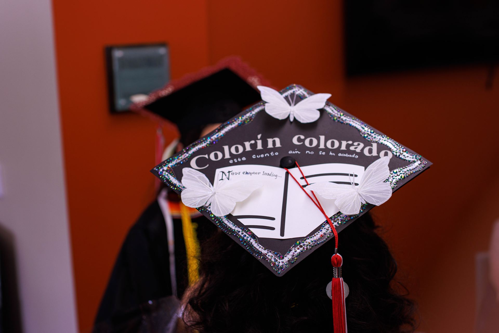 A graduation cap that says "Colorin Colorado" in Spanish.