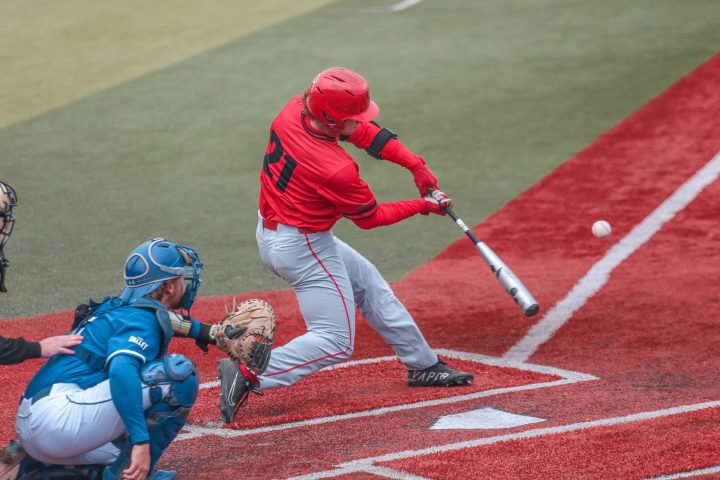 Redbird baseball player Ryan Cermak connecting with a pitch