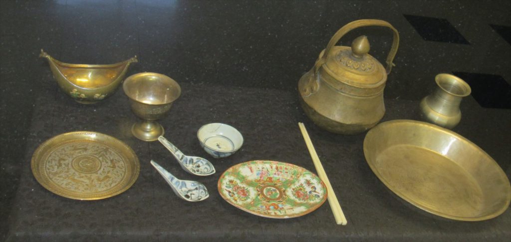 a table setting of various pieces from around the world