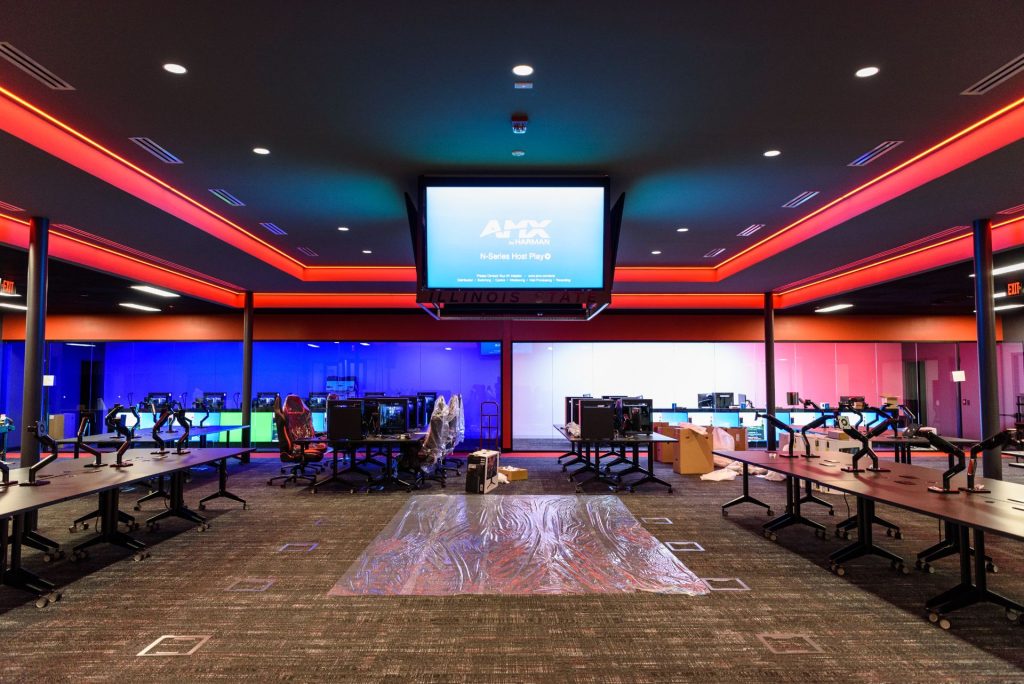esports space with computer tables and red and blue lighting