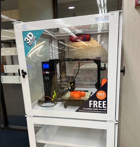 3D printer in case in Milner Library