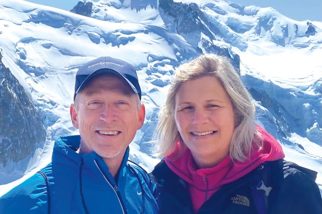 Steve and Lori Nalefski standing in front of a mountain