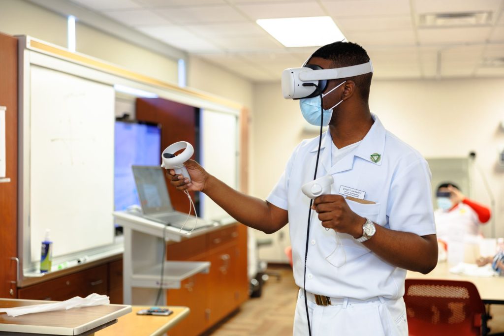 A student wearing a virtual reality headset 