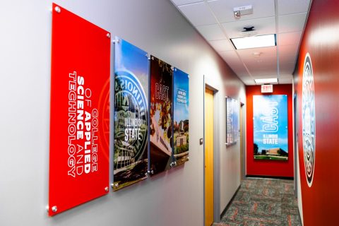 branded wall graphics inside the CAST dean's office suite
