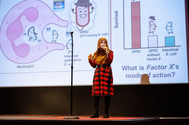 Biological Sciences doctoral student Sadia Sultana presents at Illinois State University's Three Minute Thesis competition February 23 at the Normal Theater.