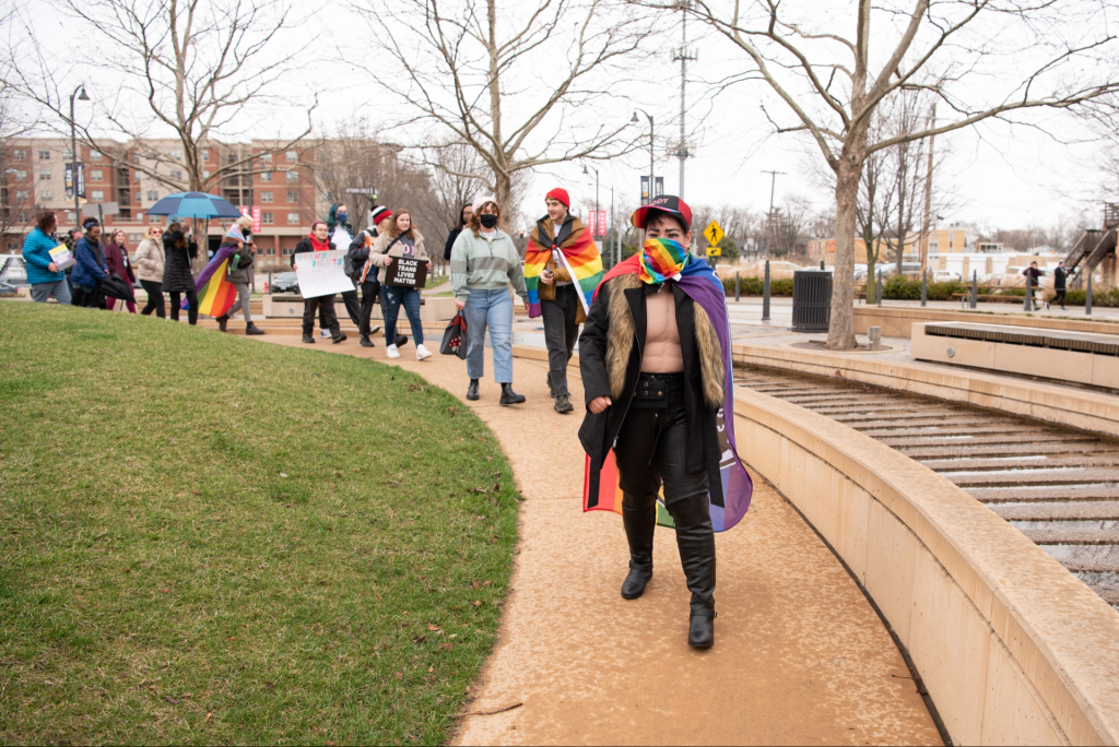 Queer Coalition Executive Board member Lawrence Lair leads the march at last year's Transgender Day of Visibility Sashay.