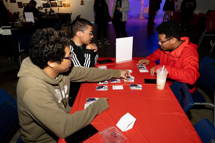 Students playing games at the 2022 Games Showcase