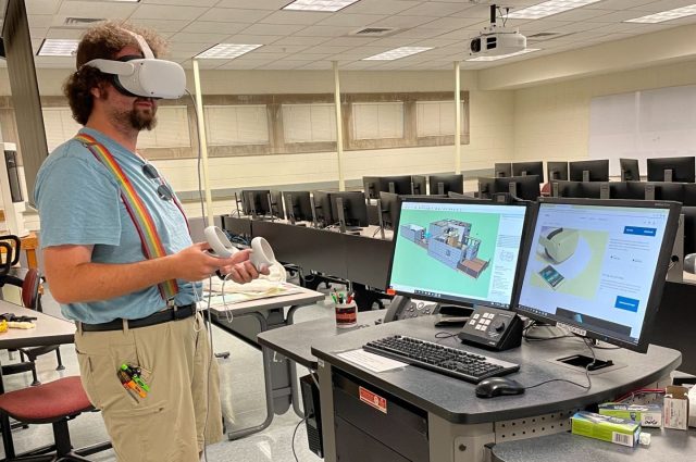 student wearing AR headset in a lab