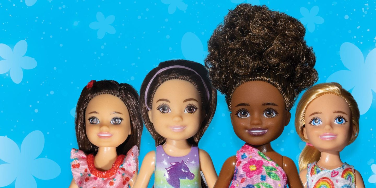 four Barbie dolls