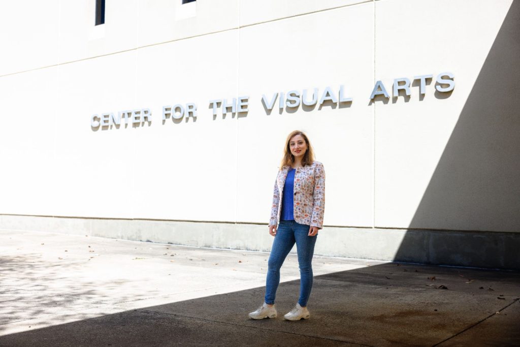 student posed outside of center for the visual arts