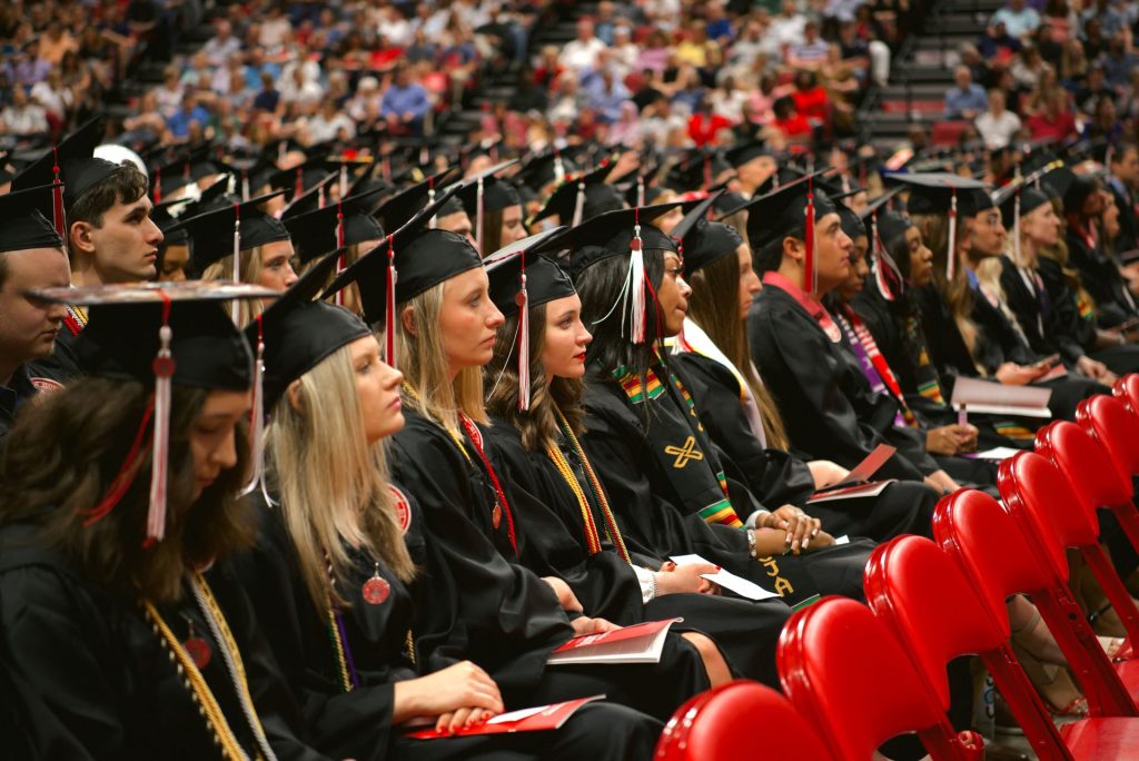 Graduating Redbirds poses at spring commencement.