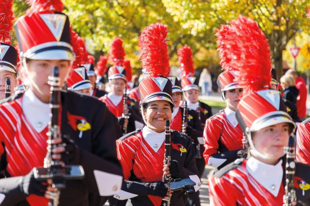 marching band student smiling during parade