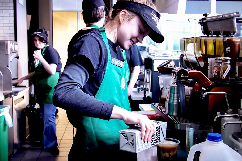 student working at Starbucks in the Bone Student Center