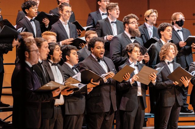 Men singing in the Center for the Performing Arts