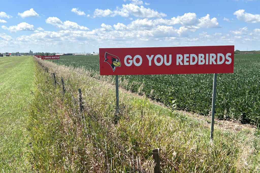 red ISU signage along Interstate 55