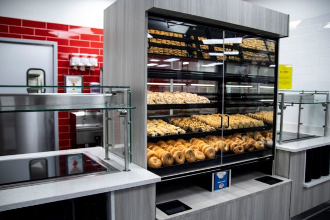 Watterson Dining Commons bakery with red wall tile and new glass cases featuring baked good.